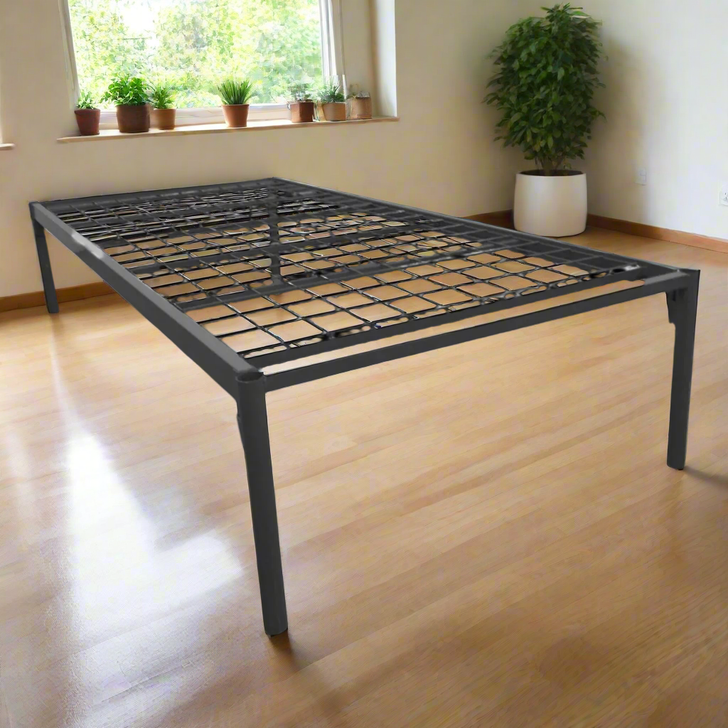 Black metal bed frame on a white background
