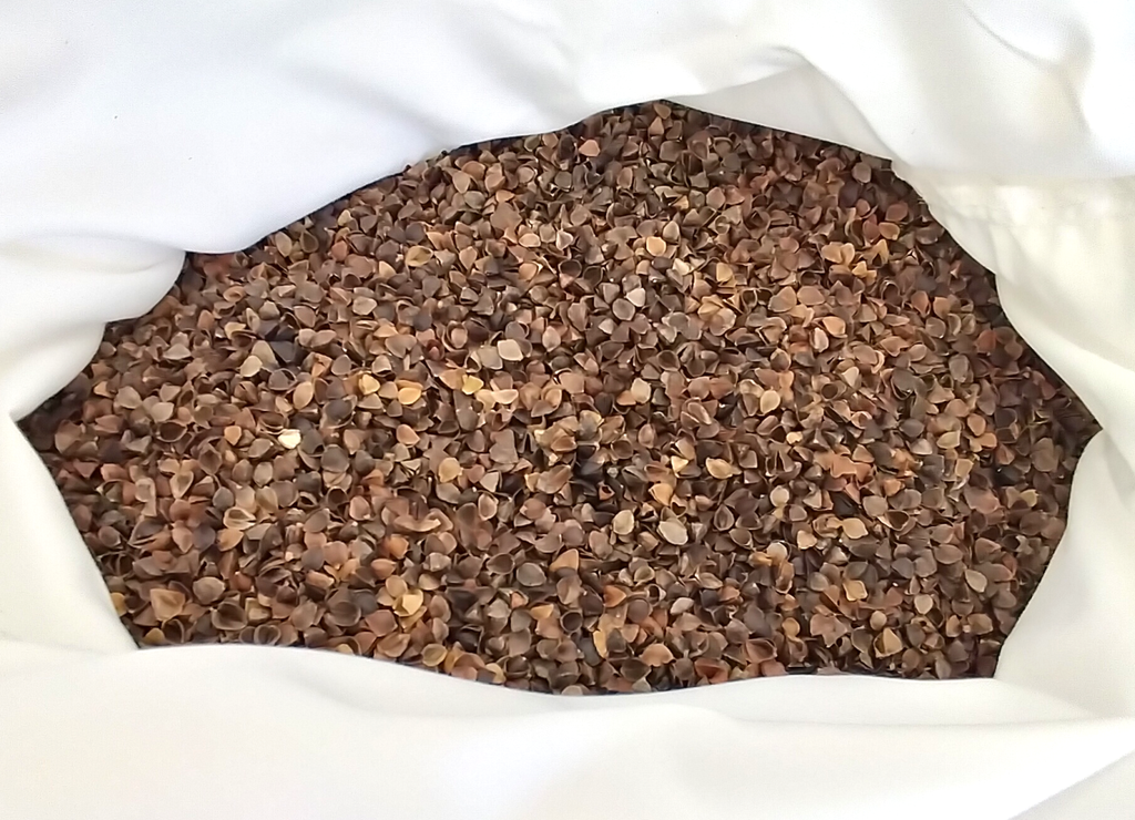 Buckwheat hull outlet filling